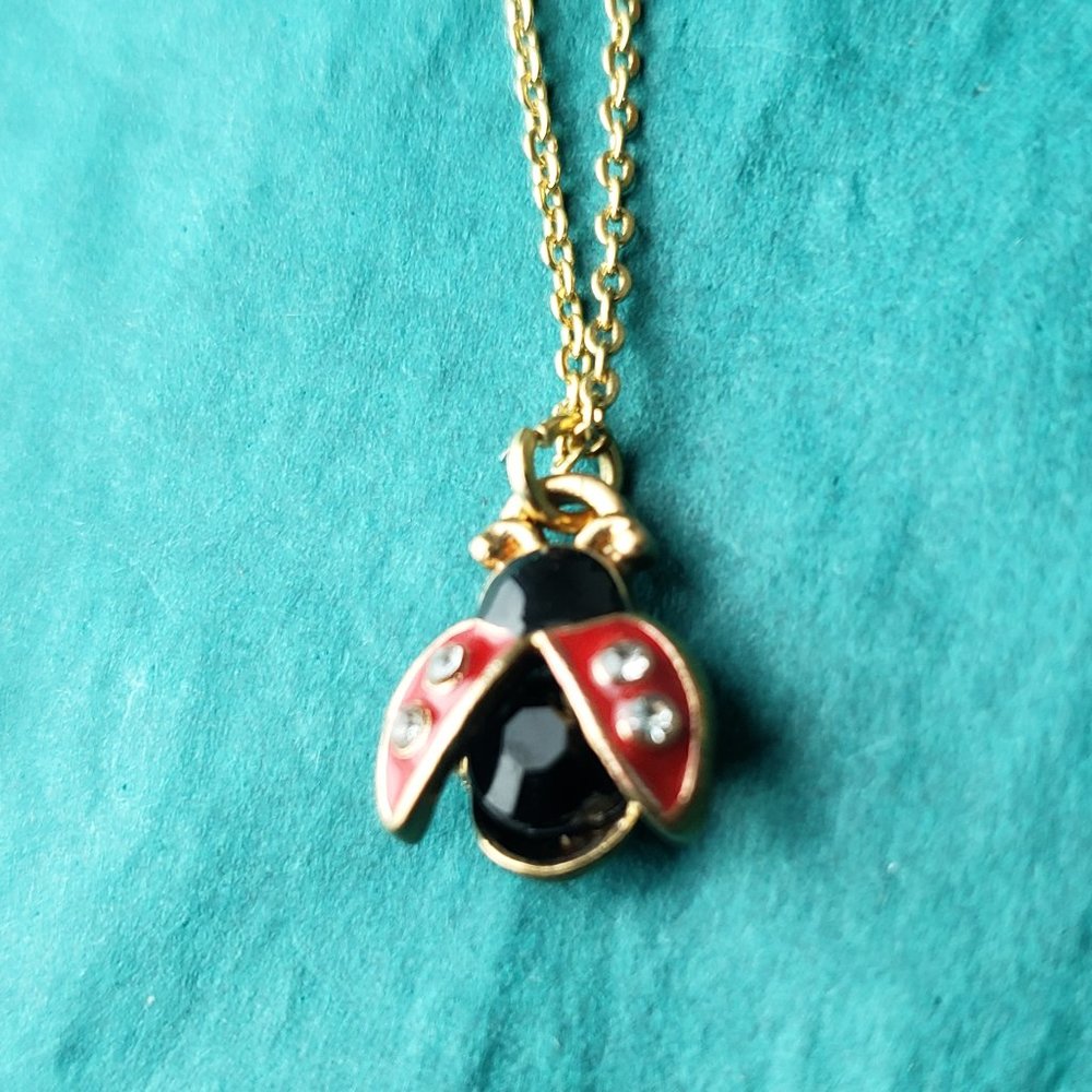 2/10$ Lady bug with open wings and rhinestones pendant necklace